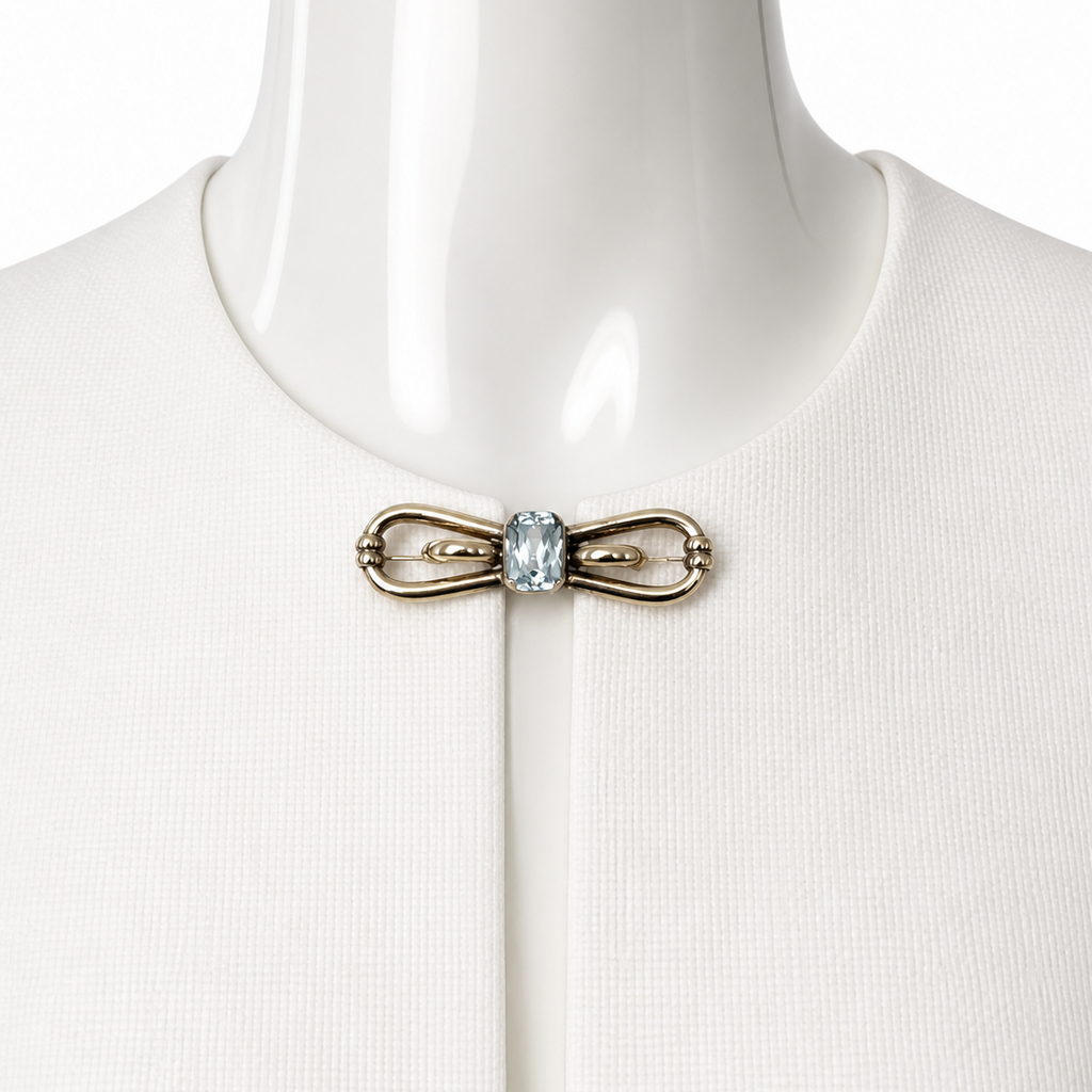 Vintage Amerikaner Brooch Gold Plated Bow Pin With Light Blue Faceted Stone