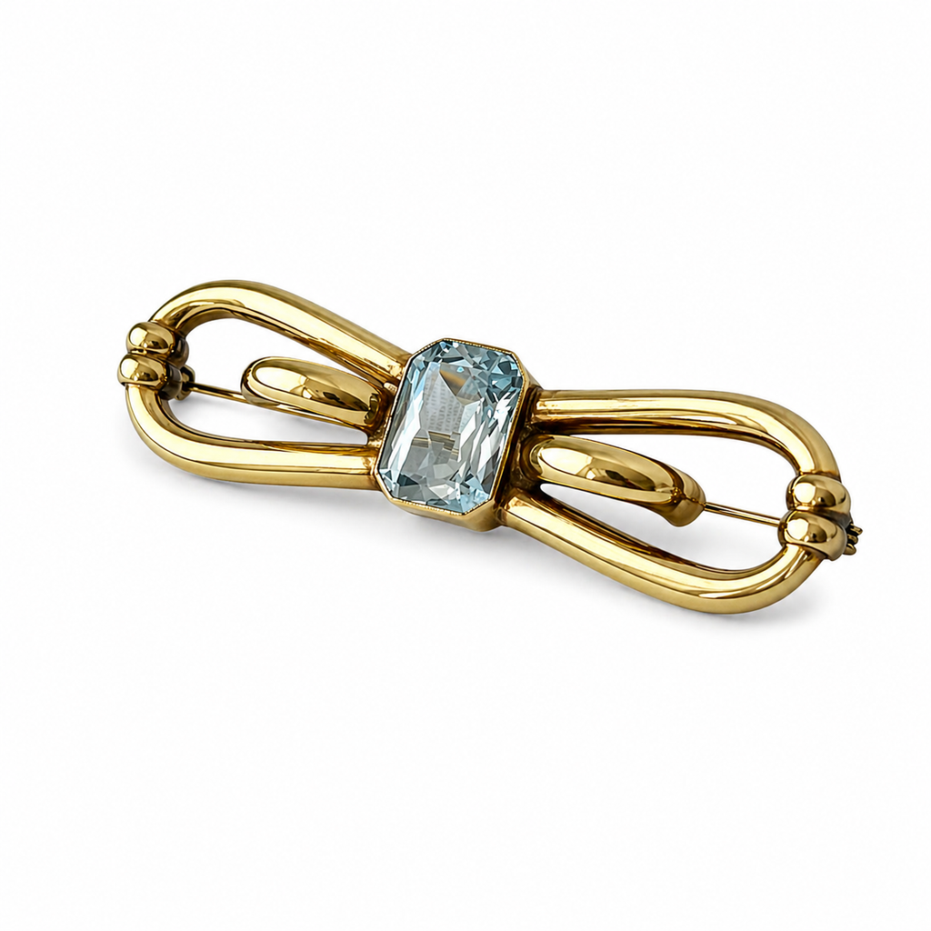 Vintage Amerikaner Brooch Gold Plated Bow Pin With Light Blue Faceted Stone