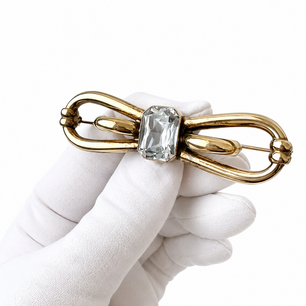 Vintage Amerikaner Brooch Gold Plated Bow Pin With Light Blue Faceted Stone