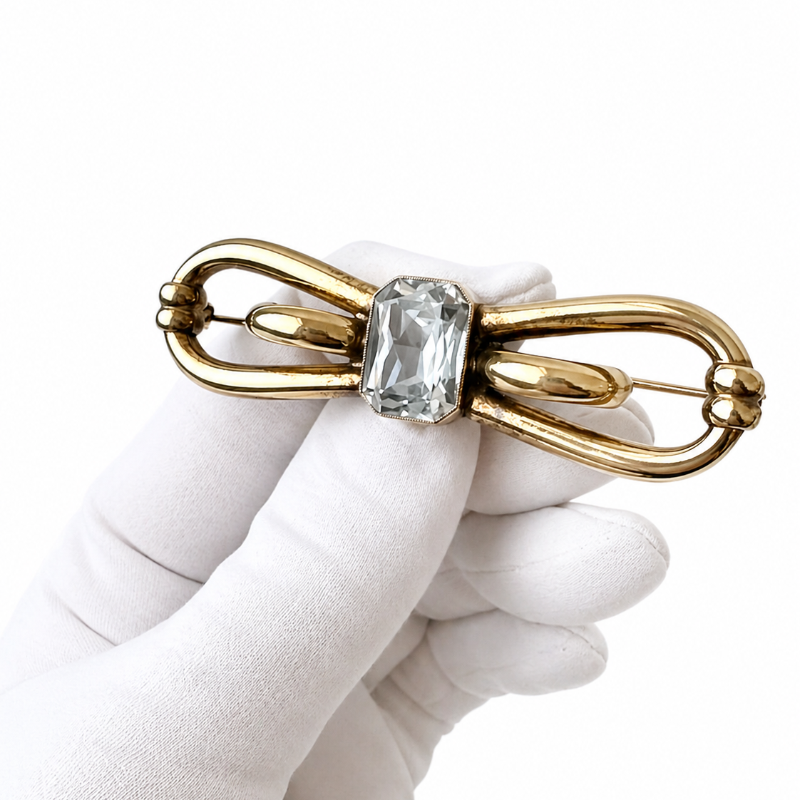 Vintage Amerikaner Brooch Gold Plated Bow Pin With Light Blue Faceted Stone