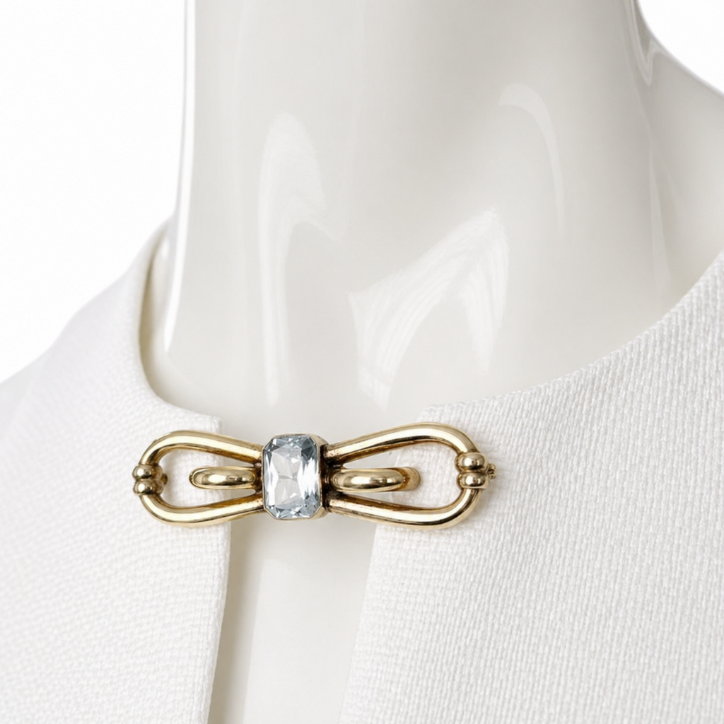 Vintage Amerikaner Brooch Gold Plated Bow Pin With Light Blue Faceted Stone