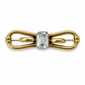 Vintage Amerikaner Brooch Gold Plated Bow Pin With Light Blue Faceted Stone